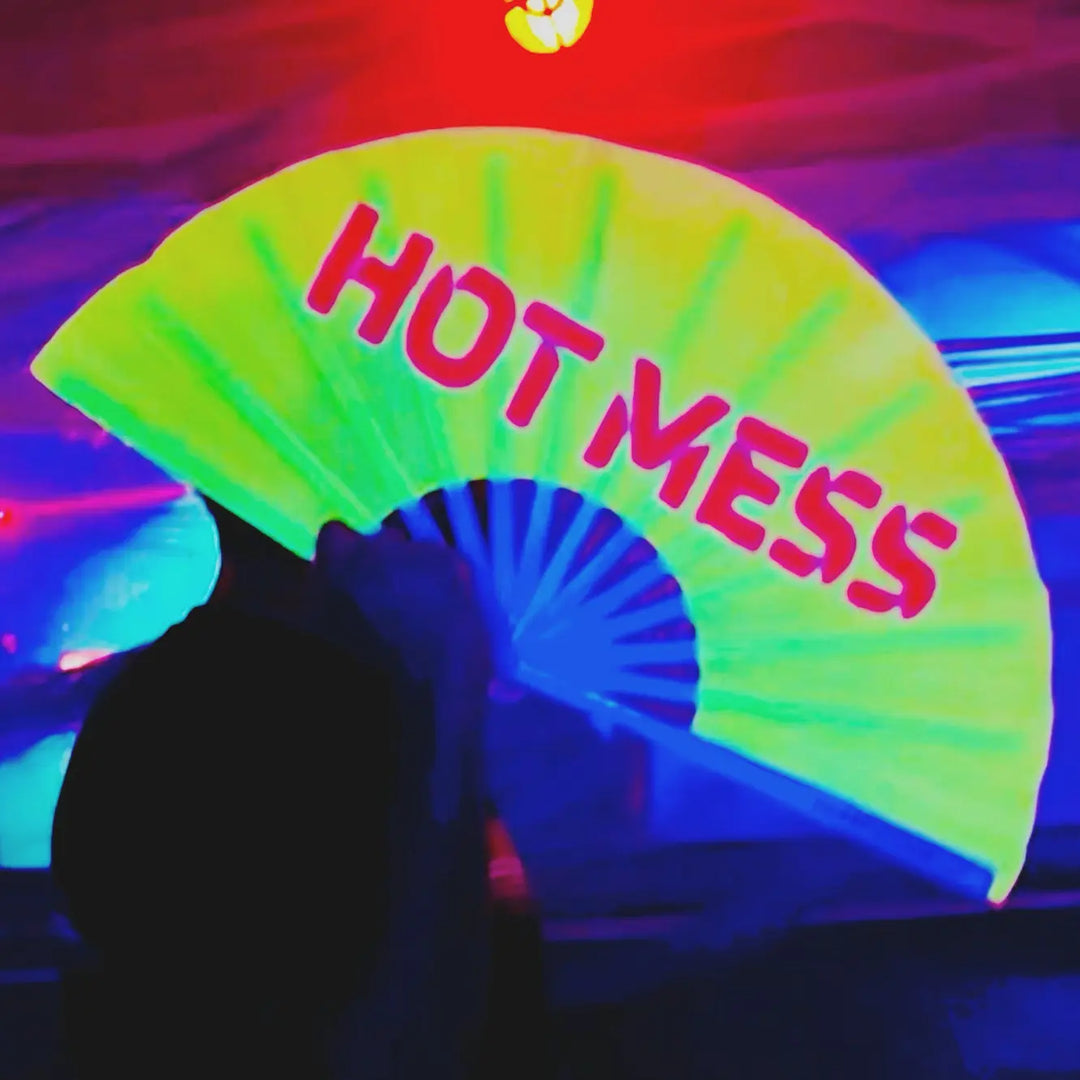 The Rising Popularity of Bamboo Hand Fans at Music Festivals and Circuit Parties The Gay Fan Club