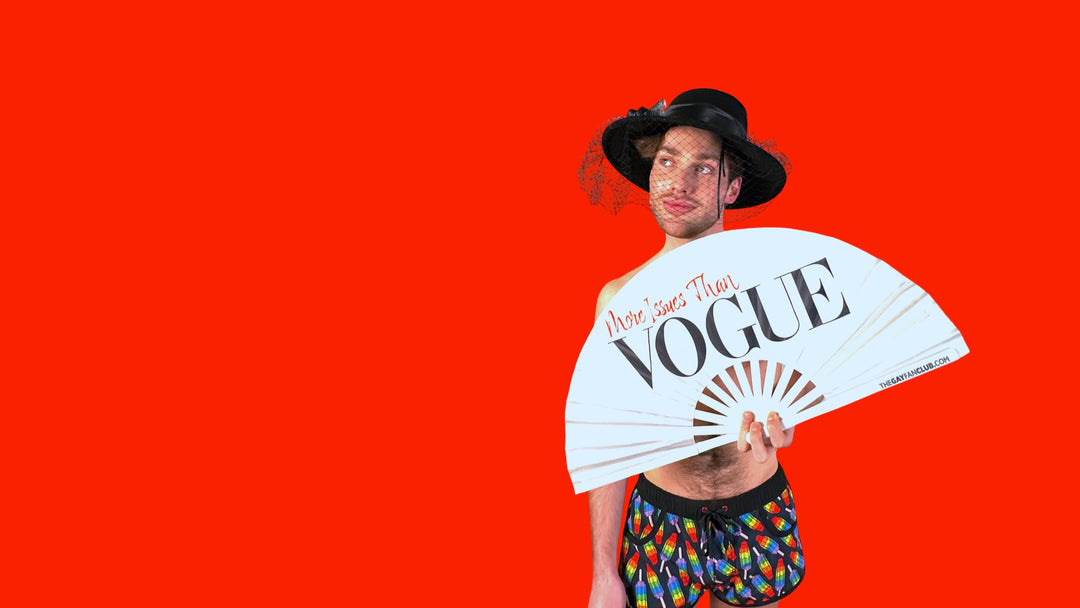 Oversized Bamboo Folding Statement Fan on a red background