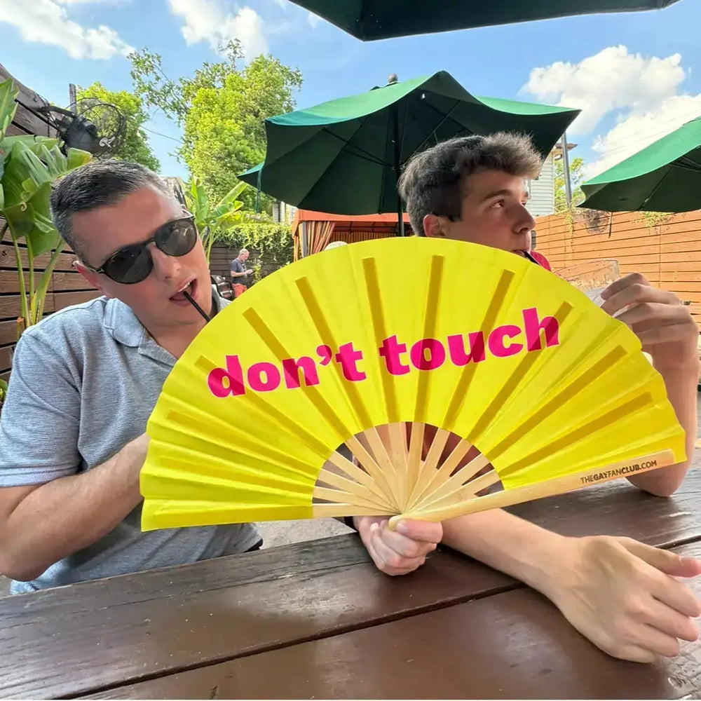 Don't Touch Fan | yellow hand fan for raves | The Gay Fan Club