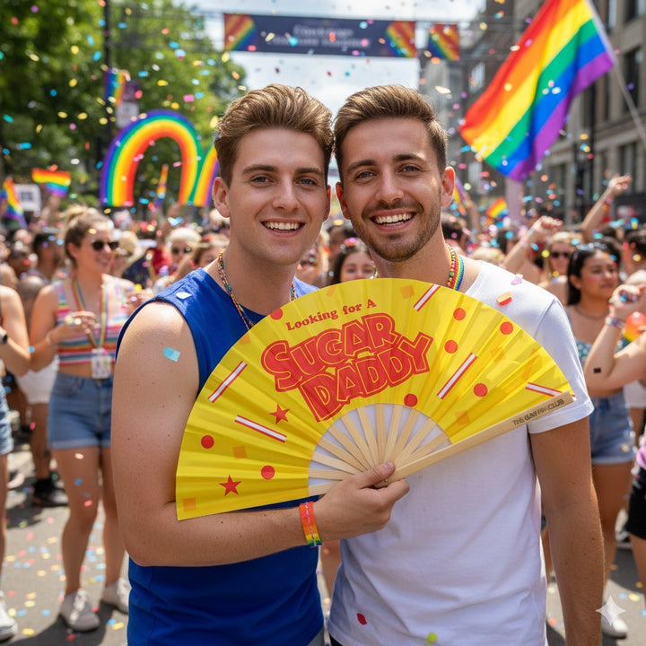 Oversized Bamboo Clack Fan with "Looking for a Sugar Daddy" Text in Red on a Bright Yellow Fabric