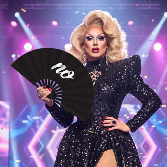 drag queen holding a black bamboo drag fan with white "no" text 