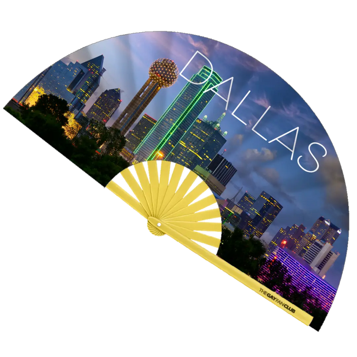 Dallitude Fan fully open showing the Dallas, Texas skyline with Reunion Tower and city lights on a natural bamboo frame.
